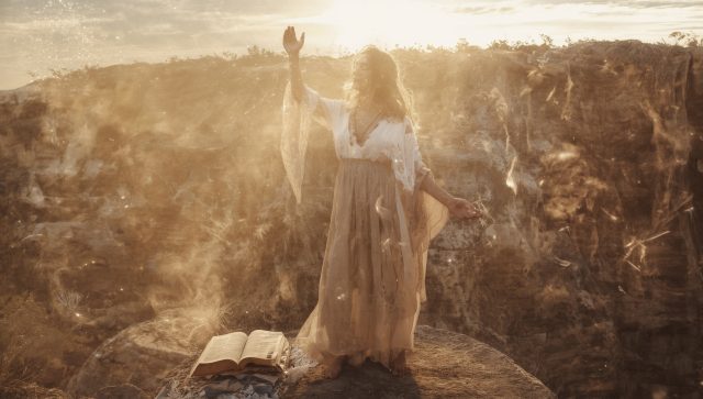 Lucid_Origin_Ethereal_boho_scene_of_a_woman_standing_at_the_ed_2